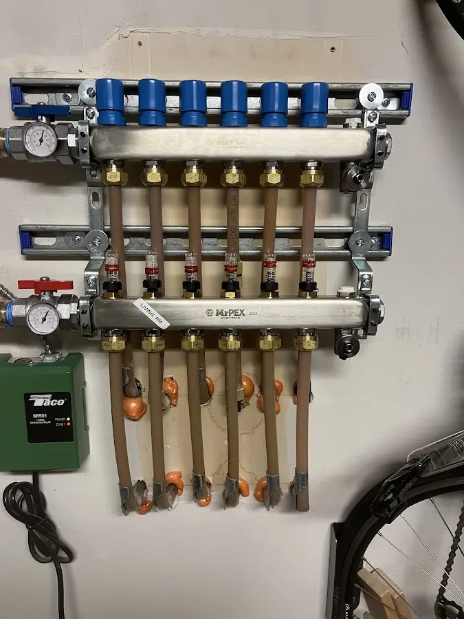 Plumber performing Gas Line Installation at a residential property in LaGrange